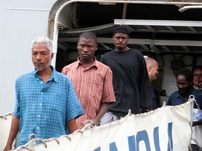 A file photo of Kenyan fishermen alighting from a Spanish Naval warship after they were rescued from Somali pirates on September 20, 2015. /NORBERT ALLAN
